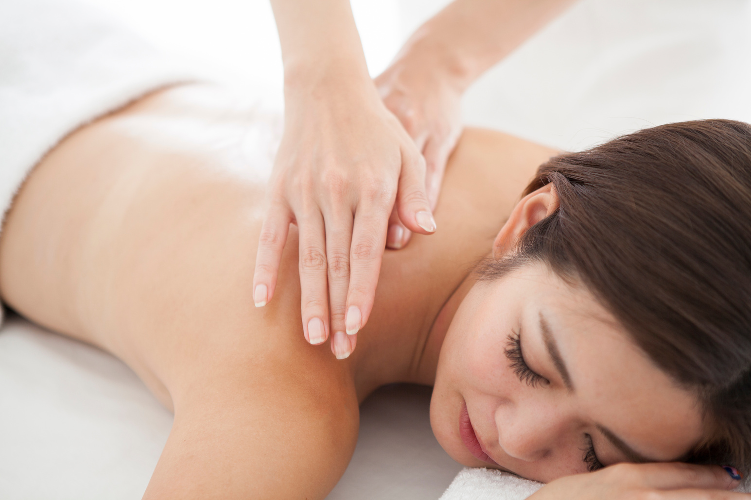 Woman being massaged by an esthetic salon